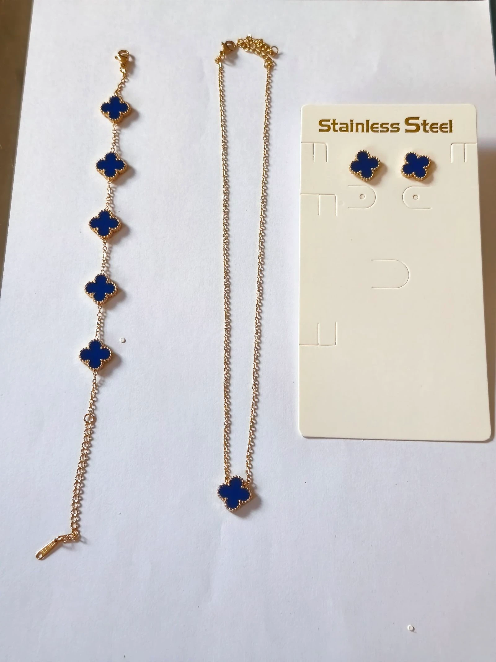 Set van trebol blauw met halsketting, armband en oorbellen met stalen ketting – photo 12